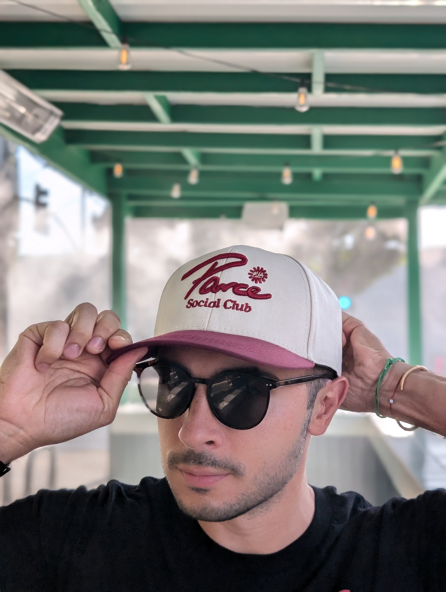 Parce Miami hat worn by man – white cap with bold red logo, perfect for sunny days
