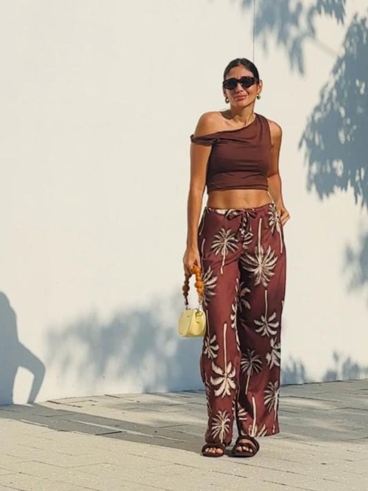 Coco Boogaloo Pant by Parce Miami – wide-leg brown resort pants with palm design and drawstring waist