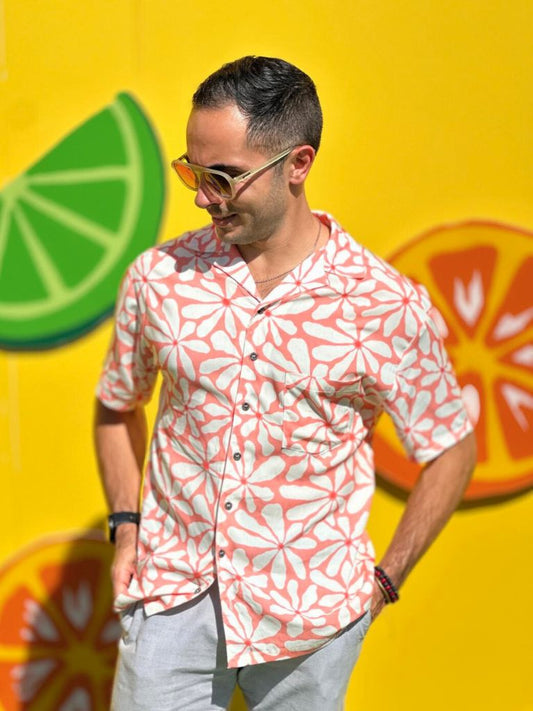 Man wearing Margherita camp shirt – vibrant floral vacation shirt in breathable rayon