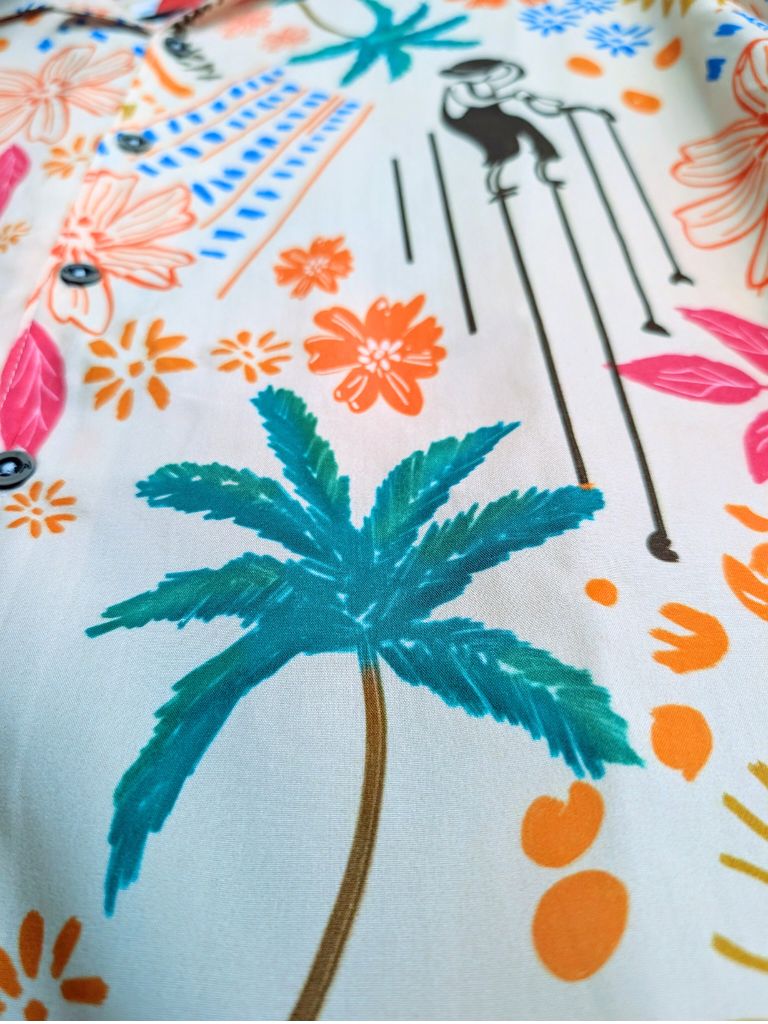 Close up view of the Parce Palm Breeze rayon camp shirt